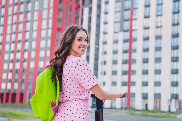 smiling girl with curls going back to school