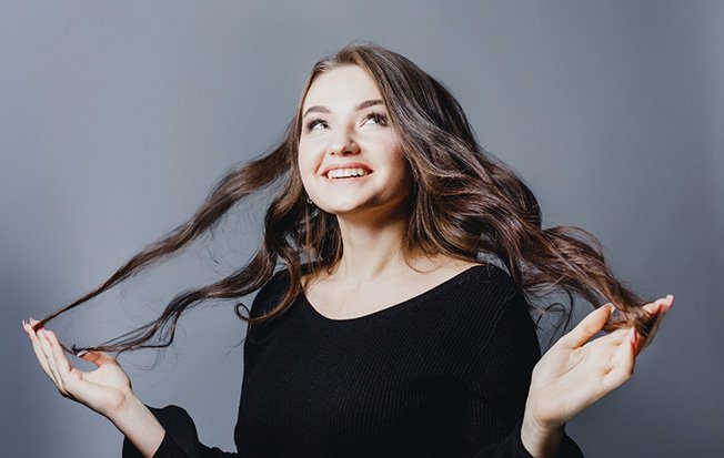 Woman with tousled wavy hair