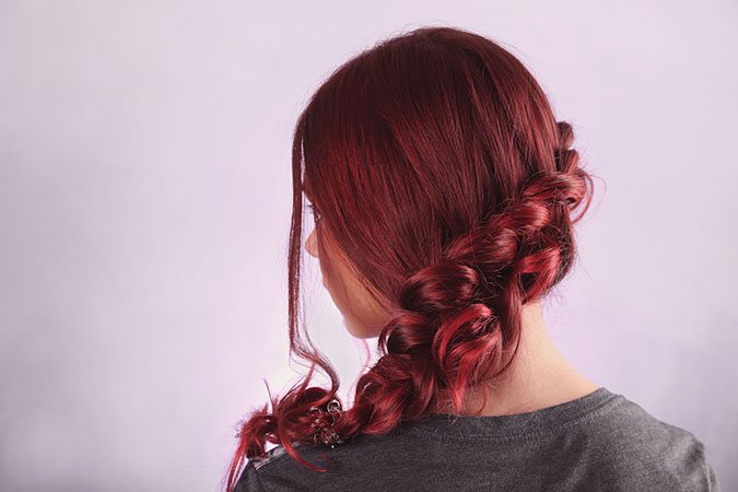 Woman with auburn hair color for fall