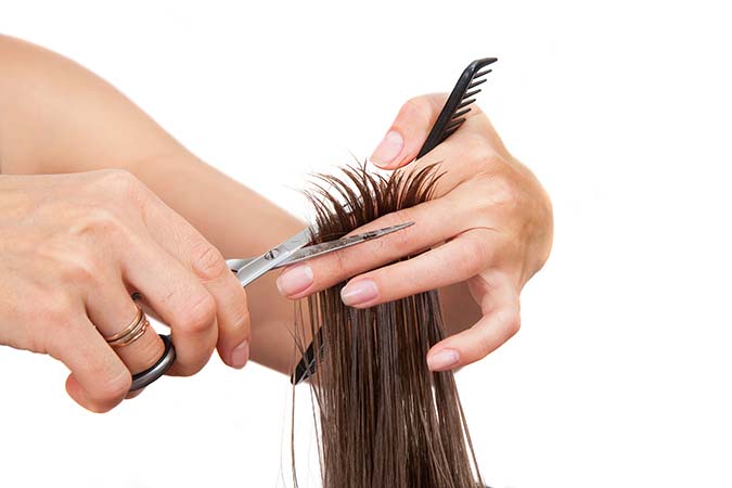 Woman getting a hair cut