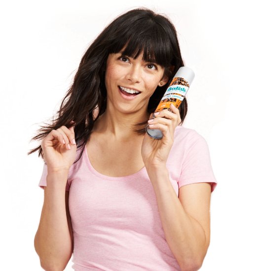 Woman with Batiste Sweetie dry shampoo.