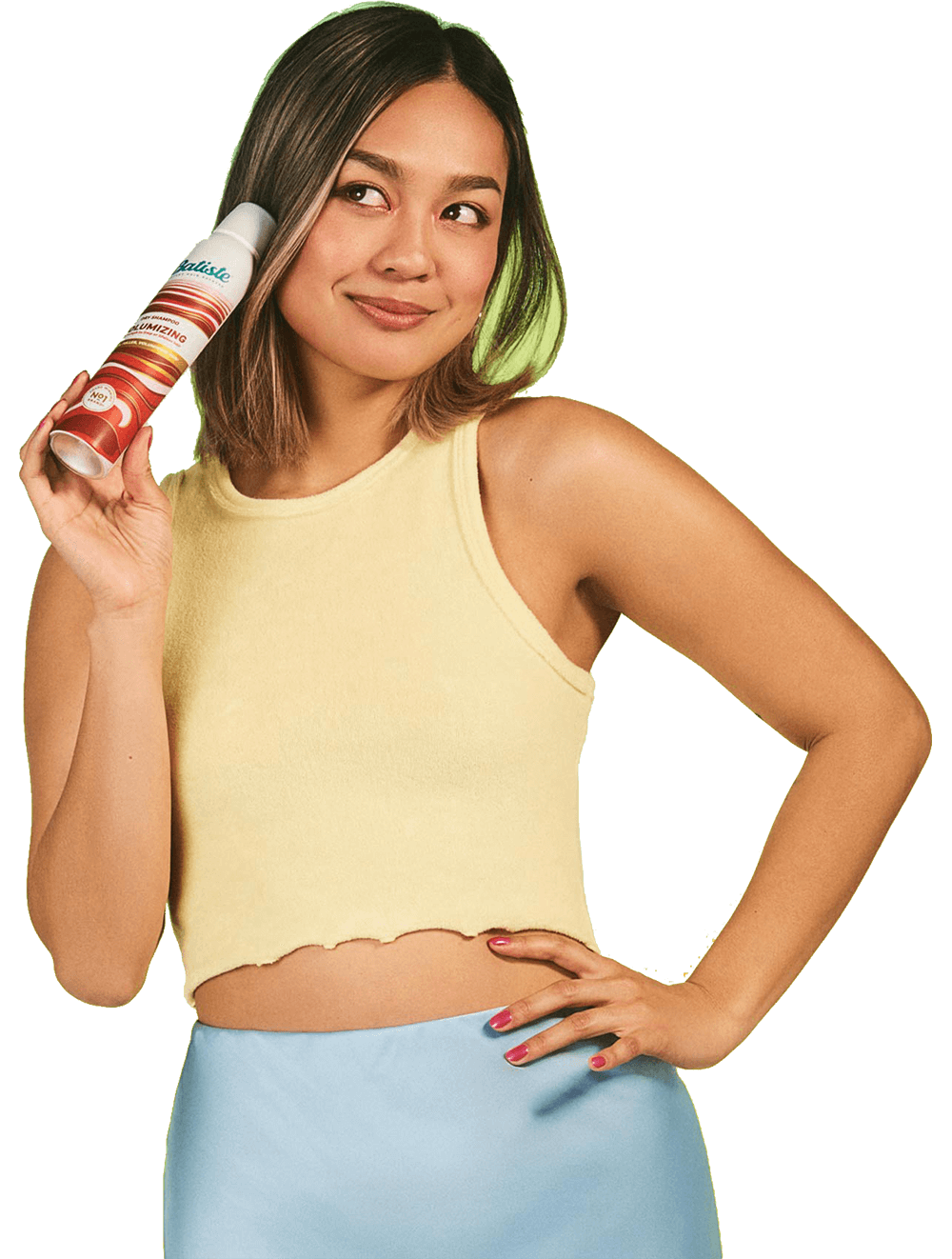 Woman holding Batiste dry shampoo