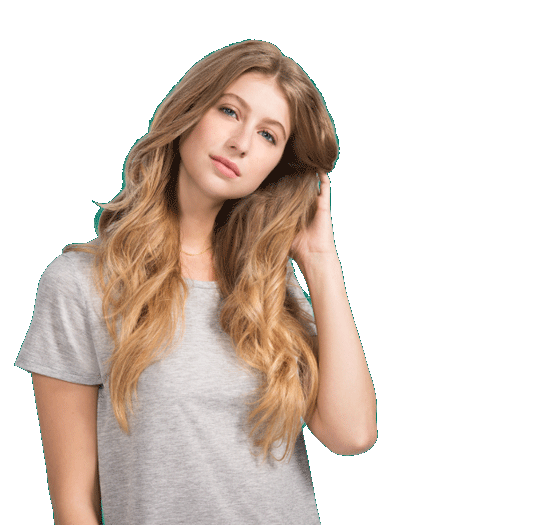 Woman post-styling her hair with dry shampoo.