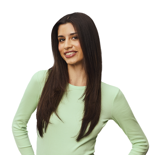 Woman post-styling her hair with dry shampoo.