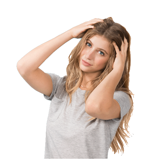 Woman putting hands in hair.